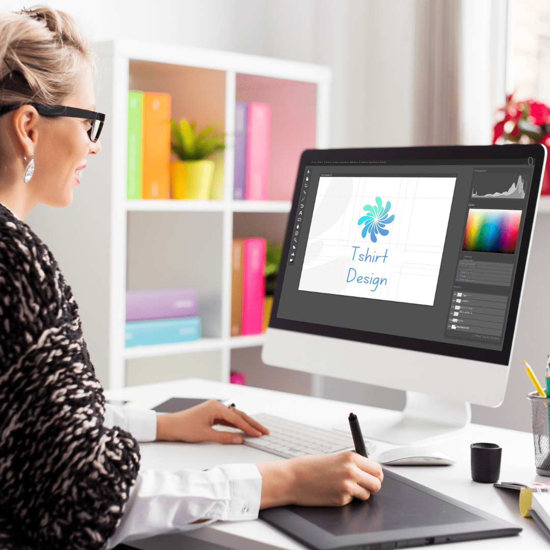 woman designing logo on a custom tshirt